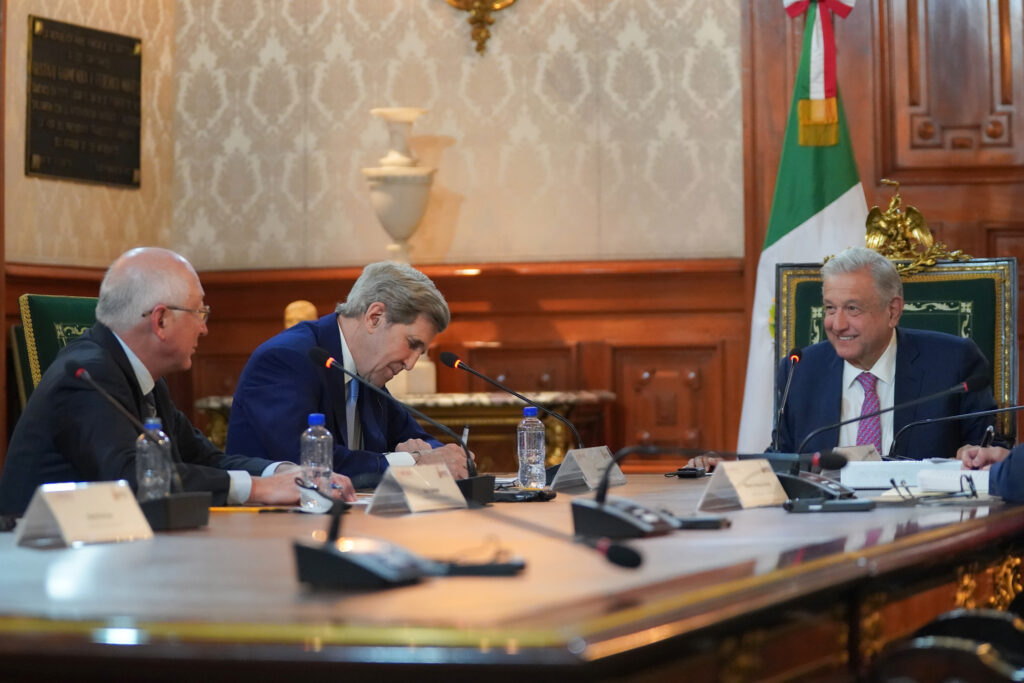 U.S. Envoy for Climate Change John Kerry talking with Mexican President AMLO